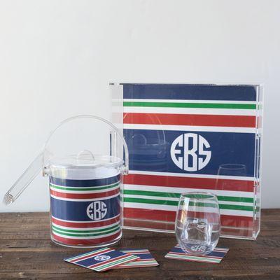 Entertainment made easy with lucite trays, ice buckets and disposable coasters - all monogrammed and customized.