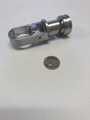 Lens actuator. Machined from aluminum. Tolerances to +/-.0005"