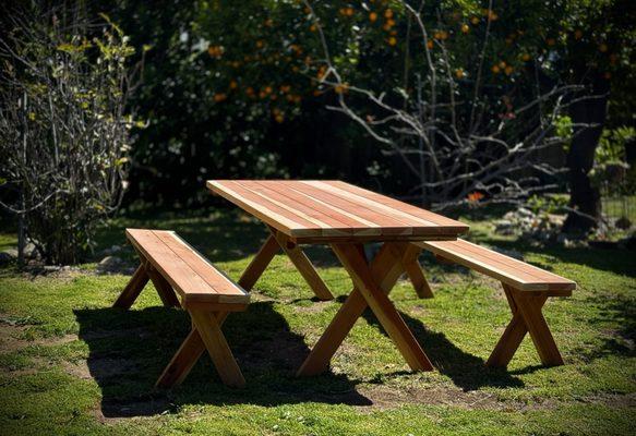 Traditional picnic table in redwood made by American Woodworks.