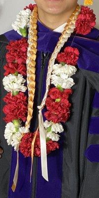 Red and white graduation flower arrangement