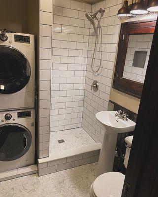 Bathroom shower with subway tile