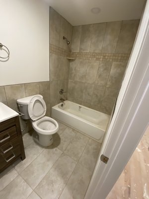 Bathroom, tiling, vanity, toilet, construction, remodeling, handyman