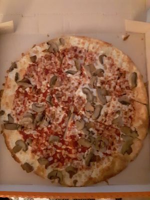 Custom pie: thin crust, mushrooms, light sauce & light cheese. Guess what. Not greasy!