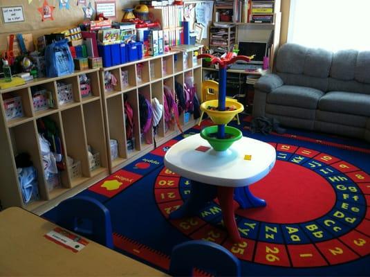 Living room play area and cubbies