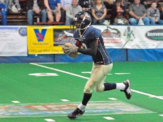 Former Wisconsin Badger Josh Nettles returns a kick.