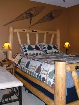 Cozy log beds and down comforters. 1 queen, 1 double, bunk beds in the hallway.