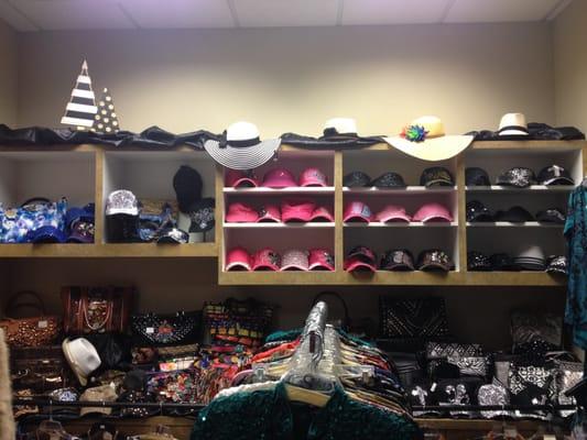 Large selection of ballcaps, hats, and purses