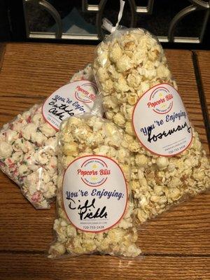 My haul from Popcorn Bliss in Castle Rock  Birthday cake, Dill pickle, and limited edition flavor Rosemary EVOO and black pepper