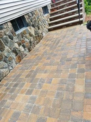 And we delivered using the right color concrete pavers to compliment his home