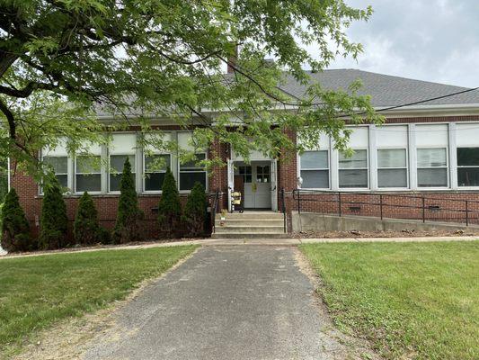 Schoolhouse Rocks Antiques LLC entrance is handicap accessible. A butterfly and fairy garden are in the works