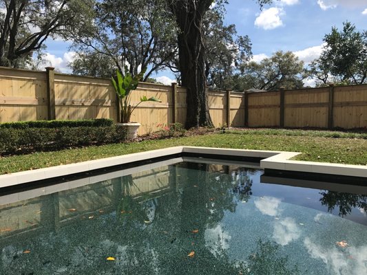 Beautiful Shelf-top Fence in Winter Park Protecting a Pool.