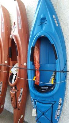 Kayaks on display outside . . .