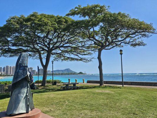 To her left is a clear view of Diamond Head