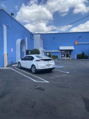 EV Spot needs a charger! Would love to see solar on the roof too if there's not already!!