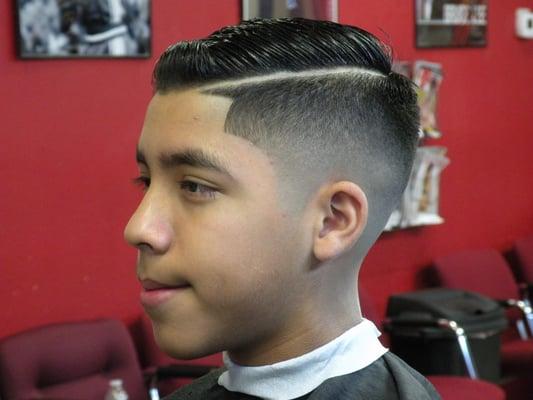 Combover skin-fade with hard part