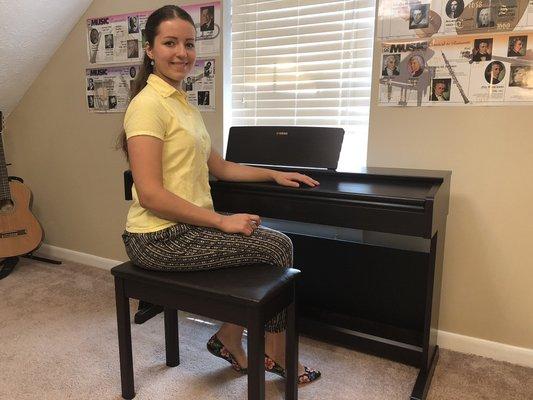 One of Yamaha's best electronic pianos is used at Olga's studio along with other materials that help students visualize musical timeline.