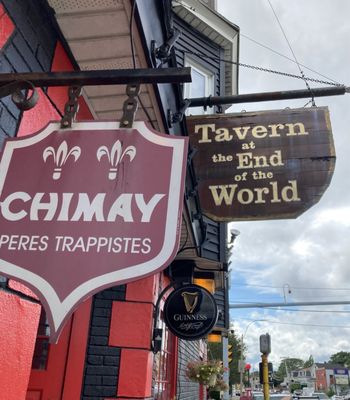 Signs outside pub.