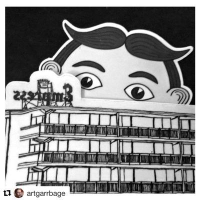 Tillie rises over the Empress Hotel. Tillie (die cut sticker), iconic fun house character originally from Palace Amusements, is iconic AP.