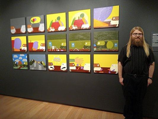 Timmothy N. Timm with his college Capstone project "Sweet Dreams gone Sour". Featuring his comic charioteers Titus & Philemon, guinea pigs.