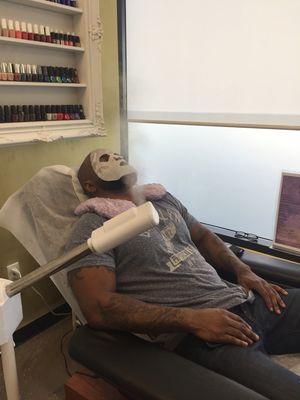 Getting his Olecea mini facial