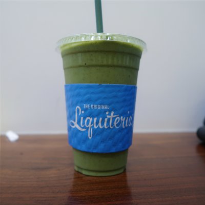 Big green smoothie - Kale, spinach,  avocado,  strawberry,  almond butter,  vanilla almond milk,  and chocolate protein powder