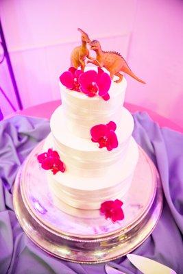 my simply designed wedding cake with my own addition of orchids and plastic dinosaurs