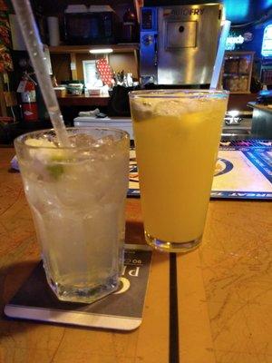 2 margaritas one with oj in it one without