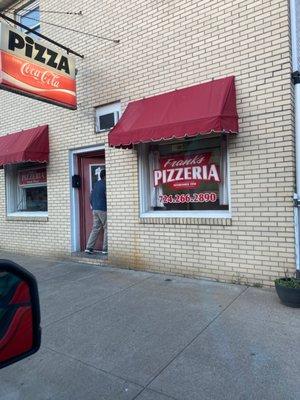 Outside of the pizza shop