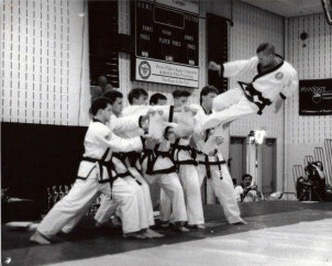 Master Matys performing a triple side kick.