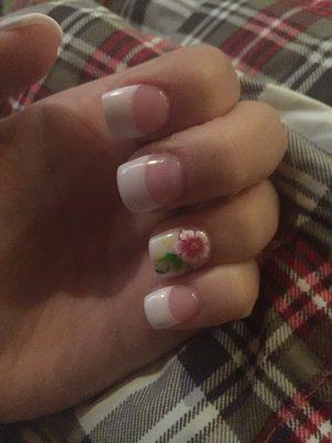 Dipping powder in pink and white with a hand painted flower.