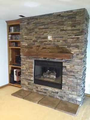 Add a visit from the fireplace doctor to do some cleanup and painting plus some new stone masonry, my looks awesome!