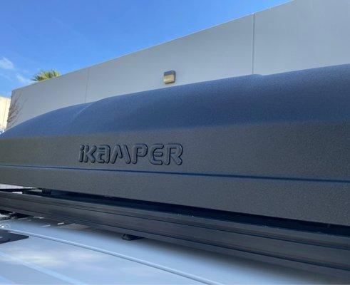 Hard shell iKamper Roof top tent sprayed with Line-x