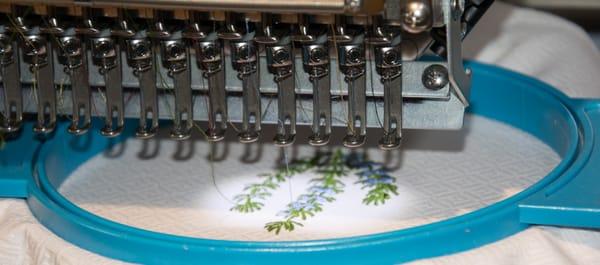 cool embroidery -- the machine is always working on some embroidery project