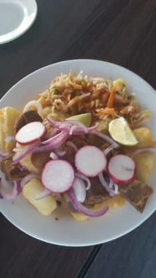 Yuca y chicharrón. An appetizer - the yuca is fried, and the chicharrón was super flavorful.