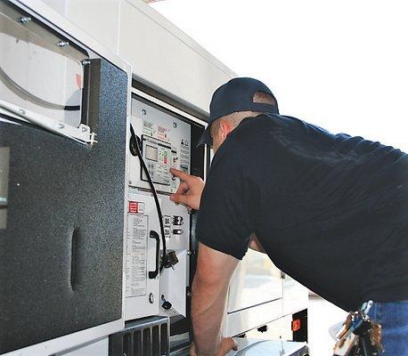 Setting up drying equipment on commercial water damage mitigation project