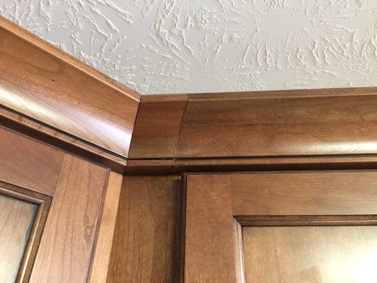 Their patched up "fix" when they had to move the cabinets over to the correct place.