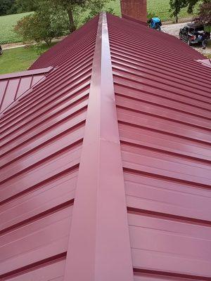 24ga galvalume burgundy stading seam metal roof!