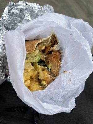 Best breakfast burrito ever! .. eggs, cheese, potato, avocado, spinach, peppers, mushrooms