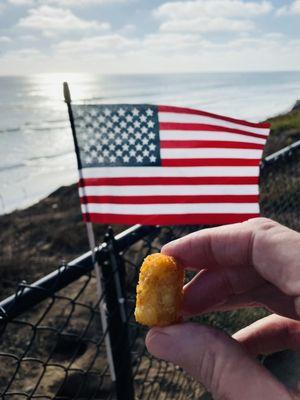 A tot, our flag and a perfect view.... No one did it better!