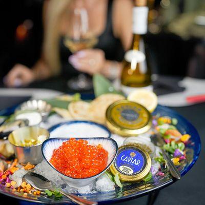 ROYAL CAVIAR SELECTION
 Kaluga Royal Black, Alaska Salmon, and Pike Roe served with Blini pancakes and condiments over the Royal Ice Platter