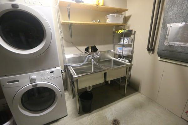 New stainless steel utility sink, replacing a 55-year-old concrete one with a hole.