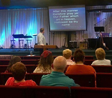 Founding Pastor Bill Traylor speaking.