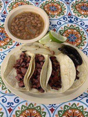 Beef fajita and sausage tacos $2 each.