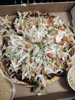 Yummy taco pizza. Must try