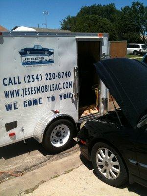 JMAC onsite recharging a car at the customer's house