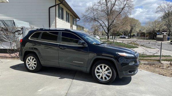 Vehicle, side front profile showing the tint.