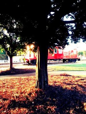 LAMAR ARTS CENTER & GALLERY restored caboose (currently being used as a film location; hence "Wind Gap, Missouri" signage).