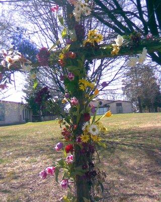 Every year at Easter, we place flowers on our cross at the front of our property at 10185  Main St. in Fairfax City, VA.