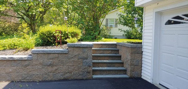 This is the completed wall and stairway on the east side of our driveway.