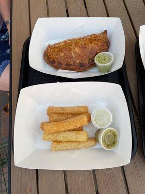 Baked beef empanada, fried yuca